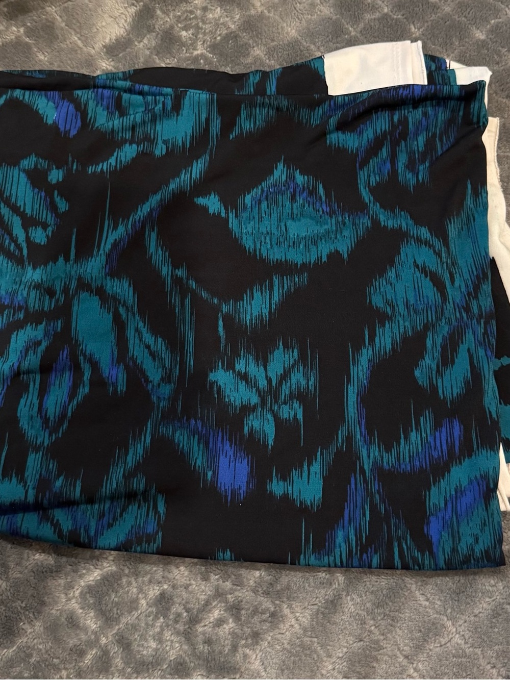 Black with blue teal color fabric